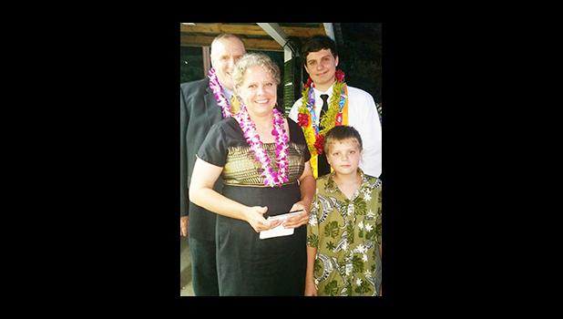 Dr. Amy Blizzard, her husband Gary, and their sons Brodie and Zane were all smiles after Brodie was inducted as a member of the NHS at the Home of the Flames last Friday. [Photo: Blue Chen-Fruean]