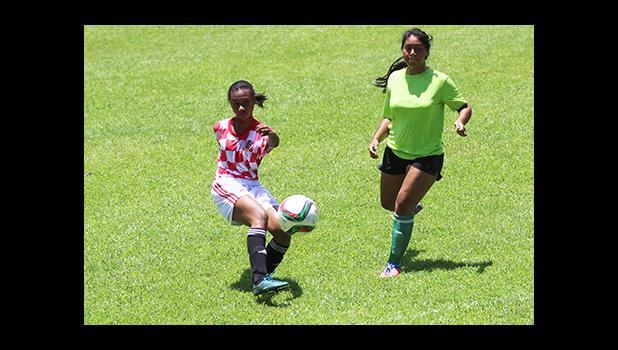  Elsy Lui of Ilaoa & To’omata takes a shot at goal against Lion Heart during a women’s game of Match Day 10 of the 2016 FFAS National League at Pago Park Soccer Stadium on Saturday, Oct. 29.   [FFAS MEDIA/Brian Vitolio]