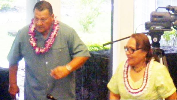 Human Resources Department director-nominee Eseneiaso Liu (right) on the Senate floor last Friday after embracing and shaking hands with Senate President Gaoteote Tofau Palaie (left). The Senate confirmation hearing confirmed the nominee last Friday morning.  [photo: FS]
