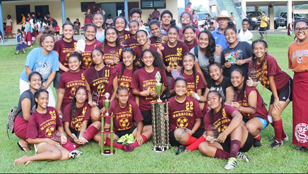 The Tafuna Warriors’ team, champions of the ASHSAA Girls varsity soccer season 2016-2017, after beating SPA 2-0 in the final at Pago Park Soccer Stadium on Wednesday, March 22, 2017.  [FFAS MEDIA/Brian Vitolio]
