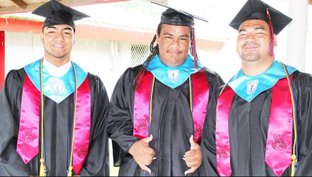 Three of the 119 graduates of Faga’itua High School’s Class of 2017 who received their diplomas yesterday morning.  [photo:EM]