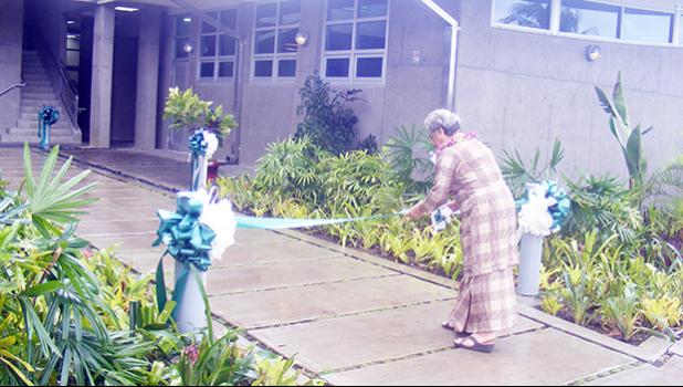 First Lady Cynthia Malala Moliga cutting the ribbon during the official dedication ceremony of the American Samoa Power Authority’s new $4.6 million Operations Center building at its Tafuna compound last Friday morning.  [photo: FS]