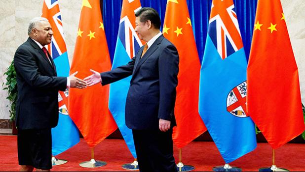 Fijian Prime Minister Frank Bainimarama and Chinese President Xi Jinping, July 2015 (Photo: Andy Wong/Getty Images via Lowy Institute)