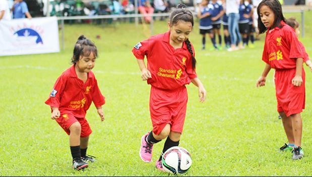 Black Roses players of the mixed 4-6 category in action during a game of the 2017 FFAS Summer Youth League on July 4 at Pago Park Soccer Stadium.  [FFAS MEDIA/Brian Vitolio]