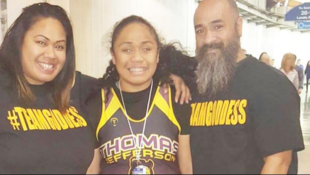 Goddess Ma’alona-Faletogo, a 14 –year-old Samoan girl — who was born blind — with her proud parents this past weekend at the Washington State Wrestling Championship in Washington, at the Tacoma Dome.  [Courtesy photo]