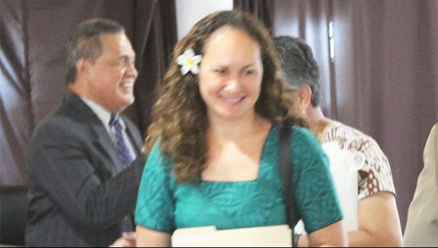 Neil’s ACE Home Center president, Ngaire Ho Ching making her way through the Senate chamber and shaking hands with senators after testifying last Thursday before a Senate committee on three administration revenue measures.  [photo: FS]