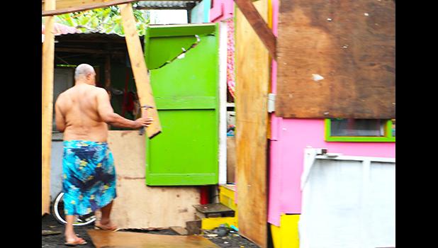 A westside resident dealing with the destruction to his home. [THA]