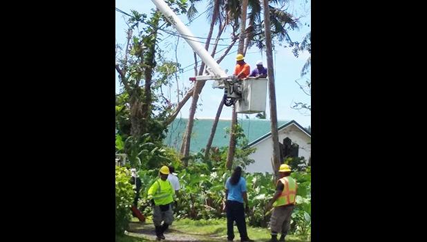 American Samoa Power Authority crews seen yesterday working on restoring electricity to family homes in Ili’ili that have been without power since last week Friday — after Tropical Storm Gita swept through Tutuila. [photo: courtesy]