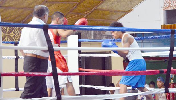 Faasala Livai (right) of Samoa looks on while Kaisa Ioane (left) of American Samoa was trying to attack during their match of the International Boxing Championship between the two Samoa last weekend at the Maliu Mai Beach Resort. [photo AF]