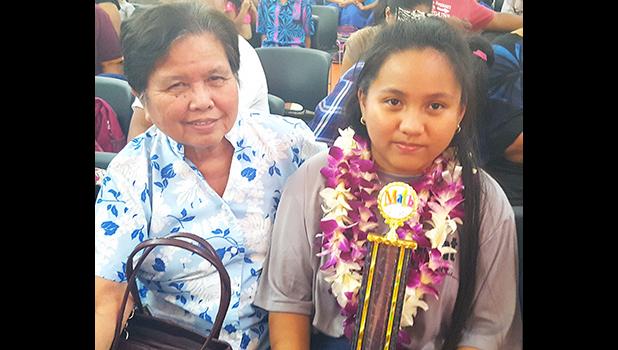 One of the First Place winners for the DOE's 21st Annual Elementary Mathematics Competition SY 2017-2018 is Jasmine Mondelo, an 8th grader at Manumalo Academy.  [photo: Blue Chen-Fruean]