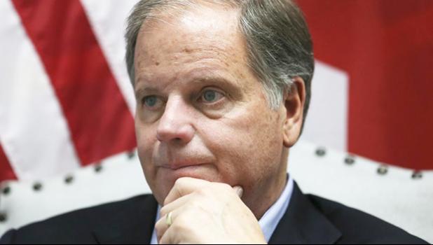 In this Dec, 13, 2017 file photo, Democrat Doug Jones speaks during an interview with the Associated Press, in Birmingham, Ala. Alabama Secretary of State John Merrill dismissed the viral story that over 5,000 of the votes for Jones in Tuesday’s special U.S. Senate election were cast by the dead. “There are not 5,000 dead people on the voters rolls unless they died today,” Merrill told the AP Thursday, Dec. 14. (AP Photo/John Bazemore) In this Dec, 13, 2017 file photo, Democrat Doug Jones speaks during an interview with the Associated Press, in Birmingham, Ala. Alabama Secretary of State John Merrill dismissed the viral story that over 5,000 of the votes for Jones in Tuesday’s special U.S. Senate election were cast by the dead. “There are not 5,000 dead people on the voters rolls unless they died today,” Merrill told the AP Thursday, Dec. 14. (AP Photo/John Bazemore)