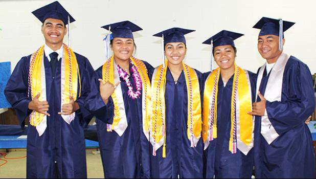 Some of the 35 graduates of “Home of the Stallions” Kanana Fou High School who turn their tassels to start a new chapter yesterday at the CCCAS Taeaoafua Gymnasium in Tafuna.  [photo: EM]