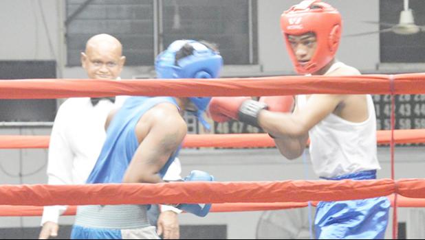 Keach Tanoa (right) of American Samoa defeated Iosefa Folasi (left) of Samoa in the last of the amateur bouts in this year’s Flag Day 2017 Boxing Championship between the two Samoas. [photo: AF]