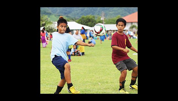 A Kanana Fou-2 player in action during a Boy’s Grades’ 3-5 Division game against Peteli Academy for the 2016 FFAS Private Elementary Schools Soccer League on Wednesday, Nov. 9, 2016 at the Kanana Fou Seminary field in Tafuna.  [FFAS MEDIA/Brian Vitolio]