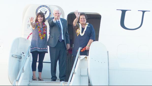 Congresswoman Amata, Vice President Pence and Second Lady Karen Pence wave to the crowd gathered at Pago Pago Intl Airport before departing for Honolulu on Air Force II.  [Courtesy photo]