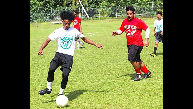 A Leone Lions’ player controls the ball against the Faga’itua Vikings during an ASHSAA Boys Soccer JV game on April 7, 2018 at Pago Park Soccer Stadium.  [FFAS MEDIA/Brian Vitolio]