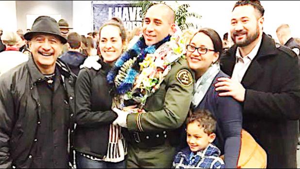 Newly sworn-in Monterey County Deputy Sheriff, Tautaimatapala Anthony Langkilde with family members and a friend, following his graduation ceremony last month. A native of American Samoa, Langkilde is the son of Tamatoa Tony (far left) and the late Bernadette “Pele” Scanlan. He was among the Dec. 17, 2017 graduates of the South Bay Regional Academy.  [photo: Langkilde family]