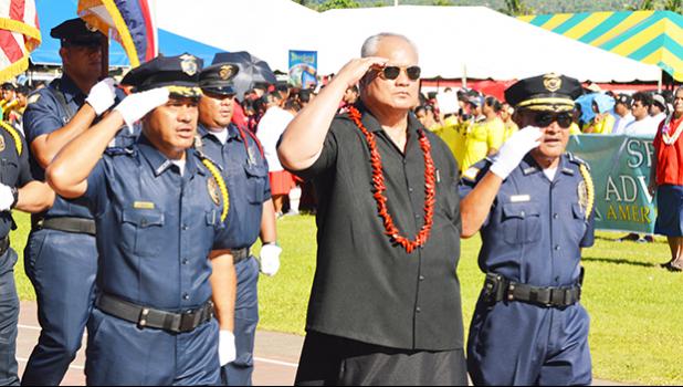 Deputy Police Commissioner Vaimaga Maiava, Police Commissioner Le’i Sonny Thompson and Deputy Commissioner Falana’ipupu Taase Sagapolutele, salute as they pass in front of the grandstand with the Department of Public Safety personnel in ‘the pass in review’ at yesterday’s 2017 Flag Day ceremony, held at the Veterans Memorial Stadium.  Le’i has initiated a  a ‘Drug Free Work Place Policy’, which is set to take effect on May 1, 2017, in response to public and government concerns about allegations of illegal d