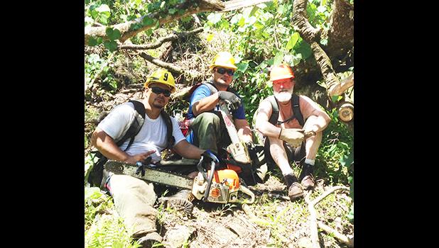 Leon Ezbitski of Pittston, Pennsylvania with the NPAS crew clearing trails in the National Park of American Samoa, after Park trails were blocked by hundreds of downed trees from Tropical Storm Gita. He took time off his vacation in American Samoa to volunteer.   [courtesy photo]