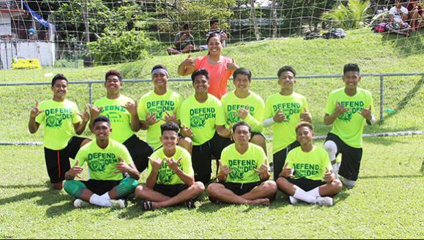 The Leone Lions J-V team and coach are all smiles after their ASHSAA Boys’ soccer playoff game on Saturday, April 29, 2017 at Pago Park Soccer Stadium.  [FFAS MEDIA/Brian Vitolio]