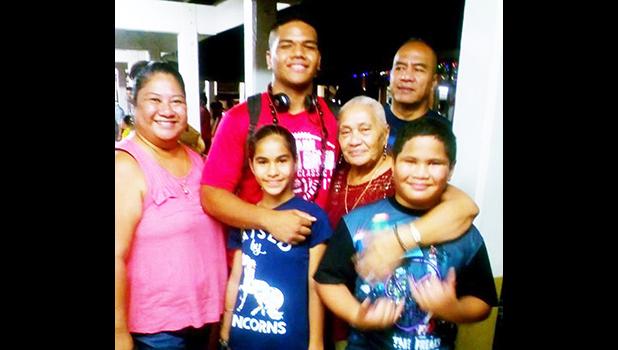 Samoana HS football standout Fautua Tufue Maiava Jr. with two of his siblings, parents Flo and Fau, and Grandma Faimalie Tua at the airport, prior to his departure earlier this month to play in the 2017 JPS Classic in Hawaii.  [photo: BC]