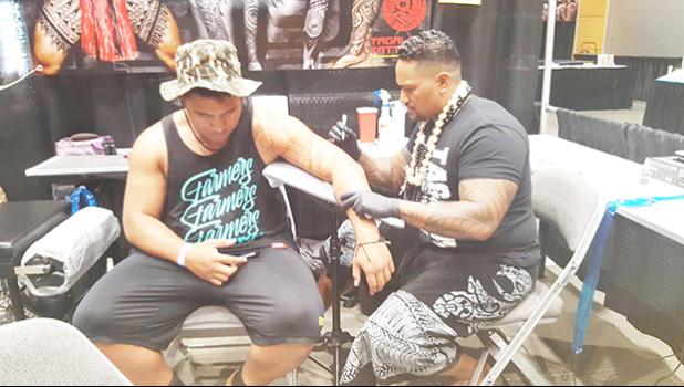 Although it was his first time attending at the Northwest Tatau Festival in Washington state, Tahitian tattoo artist Makalio - originally from Wallis and Futuna - took home top honors when his beautiful artwork won first place in the "Best Female - Large Polynesian Tattoo" category. Makalio, who speaks no English and had to communicate through a translator, is the owner of Tagaloa Tattoo Shop.  [photo: Blue Chen-Fruean]