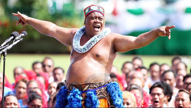 The StarKist Samoa group of 1,000 performers on the malae at Veterans Memorial Stadium during the siva and pese for 2014 Flag Day on Apr. 17.  [SN file photo / Barry Markowitz]