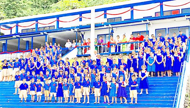 Teachers and students from Marist Saint Francis School in Lepua, posed for a photo during an assembly last week. [courtesy photo]