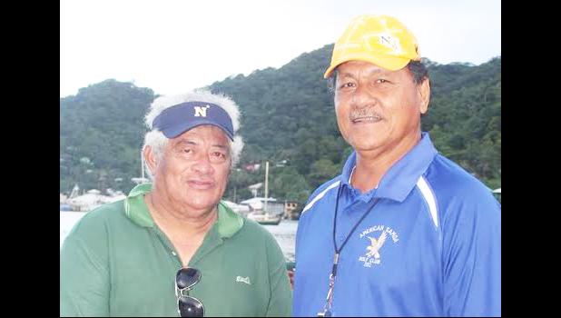 Leotiti Maselino Ioane (left) built 4 of the fautasi boats — Paepaeulupoo of Aua, Fuao of Vatia, Sinapioa of Fagaitua High School, God is Great of Pago Pago —  that raced in last week’s Flag Day fautasi regatta — the Heats, the Exhibition Race and the final 2017 Flag Day Championship Race; and they all placed. He is pictured here with Senate President Gaoteote Tofau Palaie. [courtesy photo]