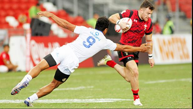 Defender Tila Mealoi and his Manu Samoa teamates played strong to the end in their Trophy Semi Final but bowed out to Wales 14-19.Singapore HSBC Sevens, Day 2, National Stadium, Singapore. [Photo: Barry Markowitz]