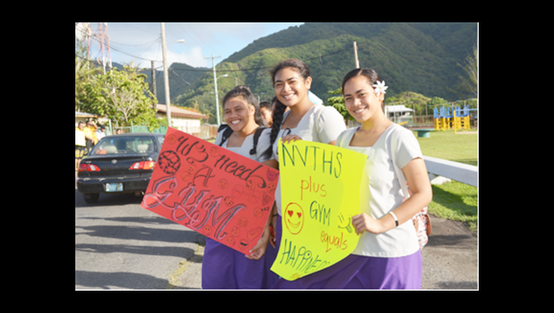 These are three students from Nu’uuli Vocational Technical High School (NVTHS) who exercised their right to freedom of speech last Friday, by participating in a wave —calling attention to the school’s key need, a gym. [courtesy photo]