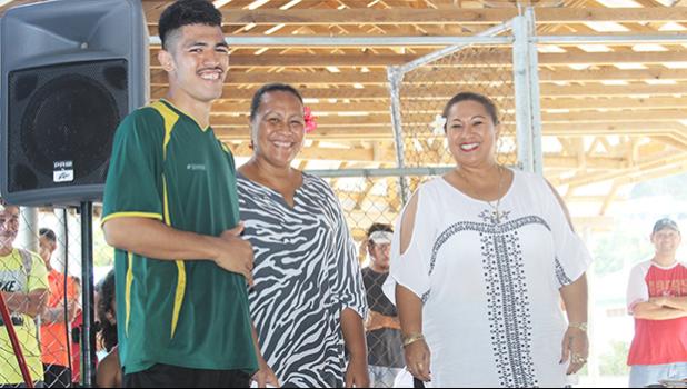 Ne’emia Kaleopa, left, of Utulei Youth receives his 2017 FFAS Futsal Tournament MVP award from FFAS executive member Amio Mavaega-Luvu (middle) and FFAS Vice- President and FIFA Council member Sandra Fruean (right), on Monday, May 29 at the Samoana High School gymnasium in Utulei.  [FFAS MEDIA/Brian Vitolio] 