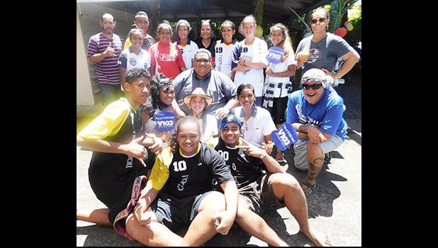 Managing Director Howard Afualo of Pacific Tires & Auto Parts with co-sponsor 93KHJ and the American Samoa Handball Team U17 Boys & Girls last Saturday at the one year anniversary celebration for Pacific Tires in Tafuna. [Photo: Ese Malala]