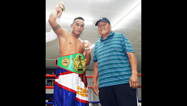 American Samoa heavyweight champion Sui “Cyclone” Palauni with his trainer and promoter, Toleafoa Henry Tavake. [photo AF]