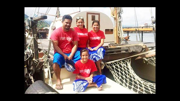 Xavier Lui with his three daughters Nafanua (middle), Leilani (right) and Emma (seated). [photo: Iona Salter] 