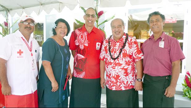 Victor Roosen (third from left) of the American Red Cross Chapter of San Diego, and Vaitoa Hans Langkilde (second from left), chairman of the local Red Cross, along with Etenauga Lutu (second from left), a long-time donor to the Red Cross, and others after yesterday’s dedication of the new Red Cross building in Tafuna.  [photo: Leua Aiono Frost]