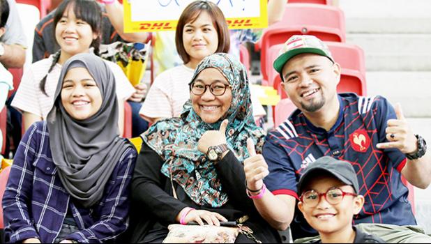 Rugby and its fans share a positive infinite diversity. Singapore Sevens, Day 1, National Stadium, Singapore. [Photo: Barry Markowitz]