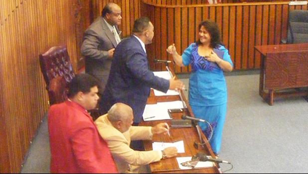 Education Department director-appointee Dr. Ruth Matagi-Tofiga (left) shaking hands and speaking with lawmakers after her confirmation hearing yesterday morning before the House Education Committee. She was later confirmed and now goes through Senate confirmation next week Monday.  [photo: FS]