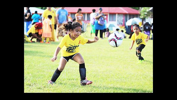 An SBA player of Grades 1-2 division in action on Match Day 2 of the 2016 FFAS Private Elementary Schools soccer league at the Kanana Fou Seminary Field on Thursday, Oct. 20, 2016.[FFAS MEDIA/Brian Vitolio] 