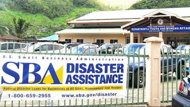 The US Small Business Administration banner in front of the Disaster Recovery Center located inside the DYWA Pago Pago Youth Center. The SBA, so far, has approved more than $1Mil in federal disaster loans to businesses and residents. See story for details.  [photo: SBA]