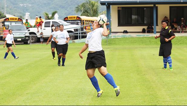 A Samoana player in action against Leone during an ASHSAA Girls varsity soccer game on Monday, Feb. 3, 2017 at Pago Park Soccer Stadium.   [FFAS MEDIA/Brian Vitolio]