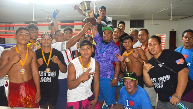Smiling faces from the Samoa boxing team after winning the Governor’s Cup during the American Samoa Flag Day Boxing Championships between the two Samoas held at the old Bowling Alley last Saturday night. The decision to give the Cup to Samoa was made by the president of the American Samoa Amateur Boxing Council after the boxing tournament ended in a 3-each win tie.  [photo by AF]