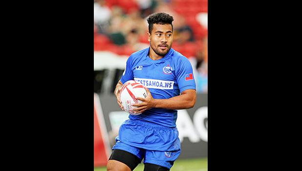 Tila Mealoi scores Samoa's second try and exudes a sigh of relief as Manu Samoa went on to upset powerful Japan 26-14 at the Singapore HSBC Sevens, Day 2, National Stadium, Singapore.   [Photo: Barry Markowitz]