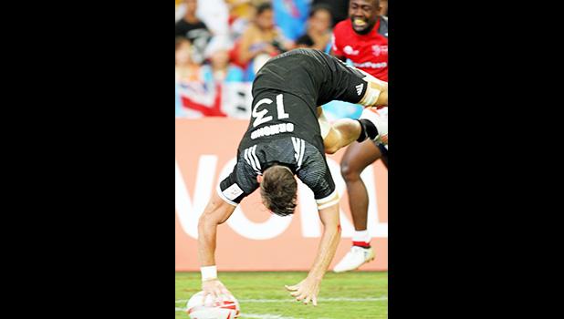 Lewis Ormond scored a scary try in New Zealand's 24-21 come from behind victory over Kenya at the Singapore HSBC Sevens, Day 2, National Stadium, Singapore.   [Photo: Barry Markowitz]