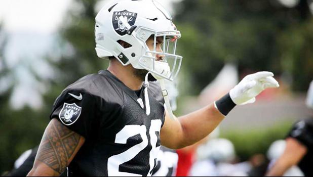 The Raiders safety Shalom Luani (26) stretched before drills. The 2017 Oakland Raiders practiced at their Napa, Calif. facility Saturday August 5th in front of several hundred adoring fans.[photo: Brant Ward] 