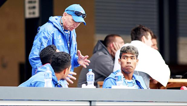 Legendary Rugby 7s Coach, Sir Gordon Tietjens, coaches up his Manu Samoa players while they snack between games at the SiliconValley 7s, Avaya Stadium, San Jose, California, USA.  [Photo: Barry Markowitz]