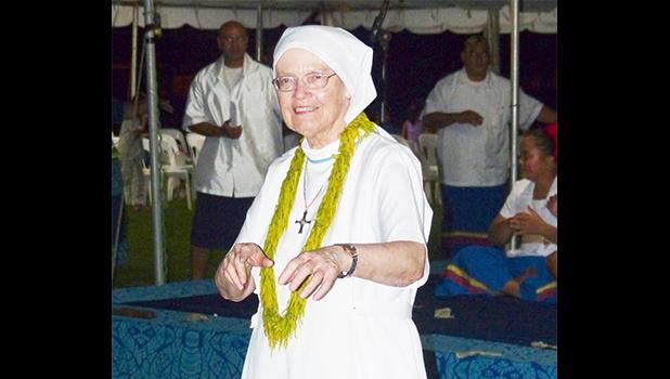 Sister Sheila, who traveled from Britain to join the rest of American Samoa to celebrate the 30th Anniversary of Hope House, got to dance on the grounds she walked and served once before, Fatuoaiga, Heart of Families. She was instrumental in the opening of Hope House in 1987.  [photo: Leua Aiono Frost]