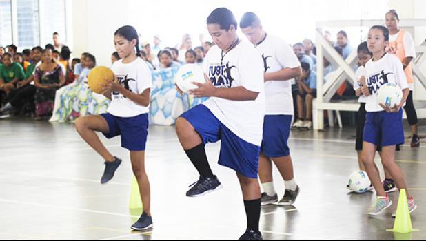 St. Theresa students perform a skill from the theme of their presentation during the ASDOE/FFAS Just Play Program finale on Thursday, April 27, 2017 at the DYWA gymnasium in Pago Pago.   [FFAS MEDIA/Brian Vitolio]