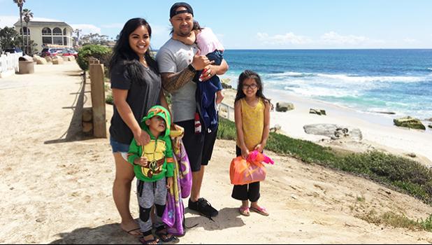 Kalikimoku Hunt, an American Samoan, has created the ultimate survival guide for stay-at-home parents — especially for dads seen here with his family. He is hoping to have the book published by Father’s Day this year. See story below.  [Courtesy photo]