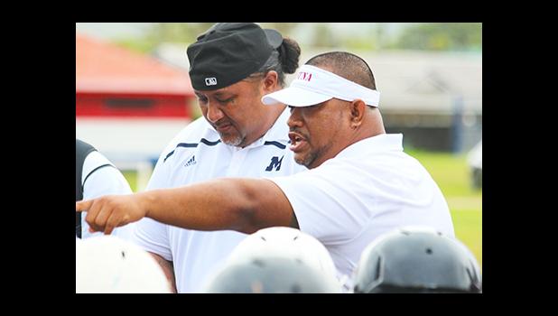 Tafuna High School’s new Head Football Coach Kolose Ili speaking to his players after their victory over the Sharks this past weekend – where he emphasized humbleness, humility, and that it was only the beginning.  [photo: TG]